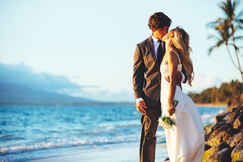 Couple Kissing During Wedding in Hawaii