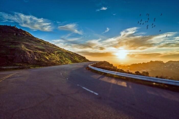 Winding road at sunset