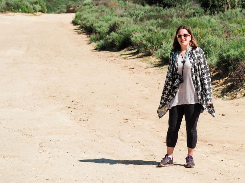 Kim Magaraci, Managing Editor at ViaTravelers, on a hike in Newport Beach, California