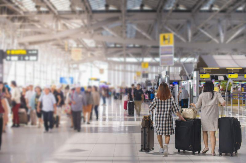 Travelers in Airport Terminal