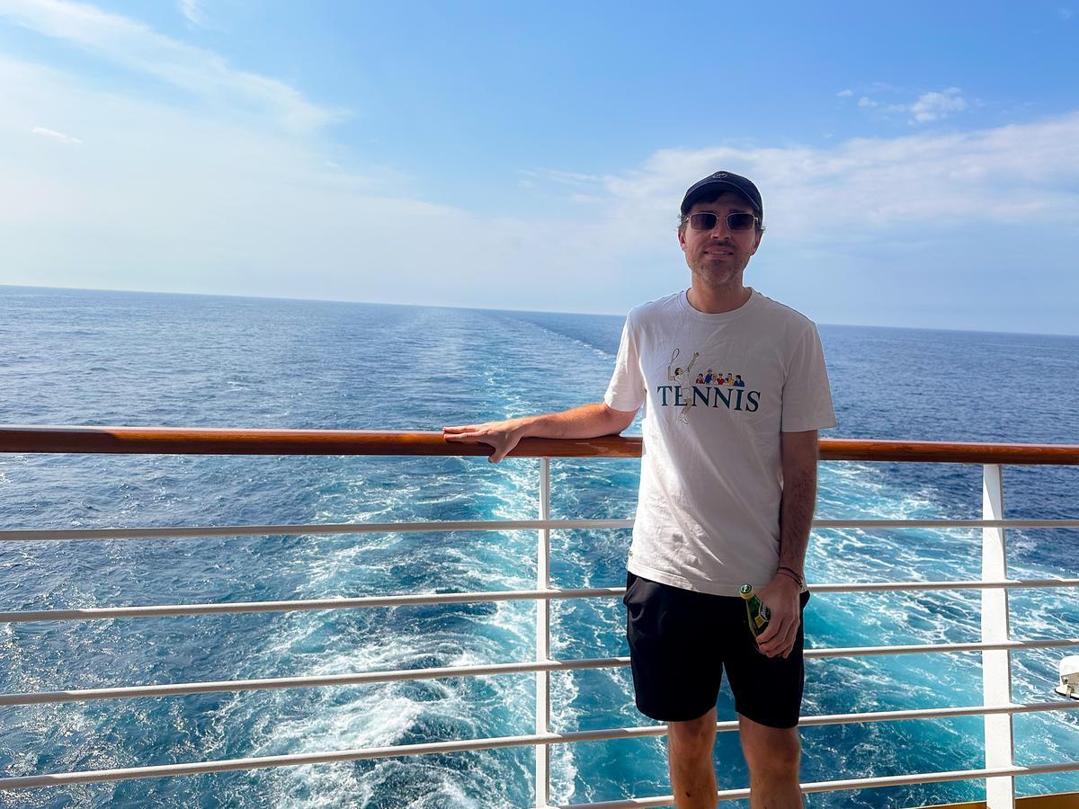 Kyle Kroeger of ViaTravelers enjoying ocean views on Holland America MS Rotterdam cruise ship review