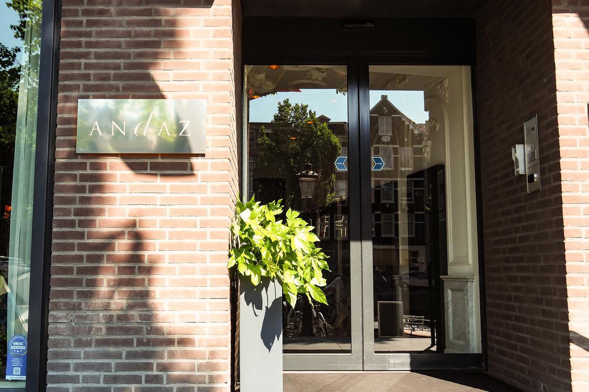 Andaz Amsterdam Prinsengracht Hotel entrance with modern design and greenery