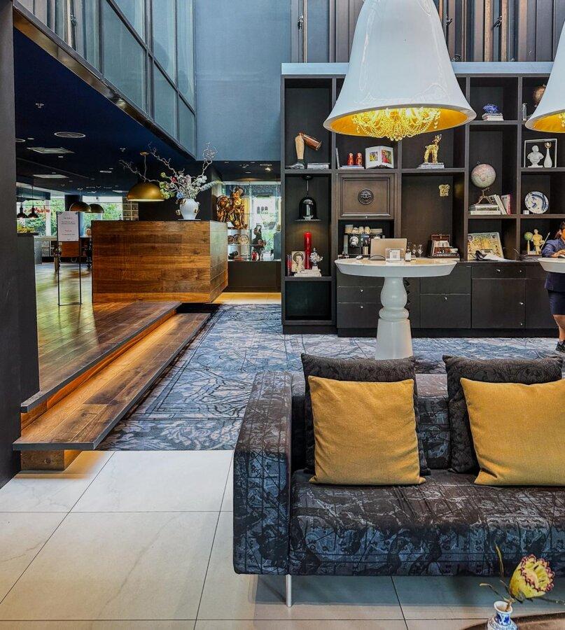 Elegant Andaz Amsterdam hotel lobby with modern luxury decor