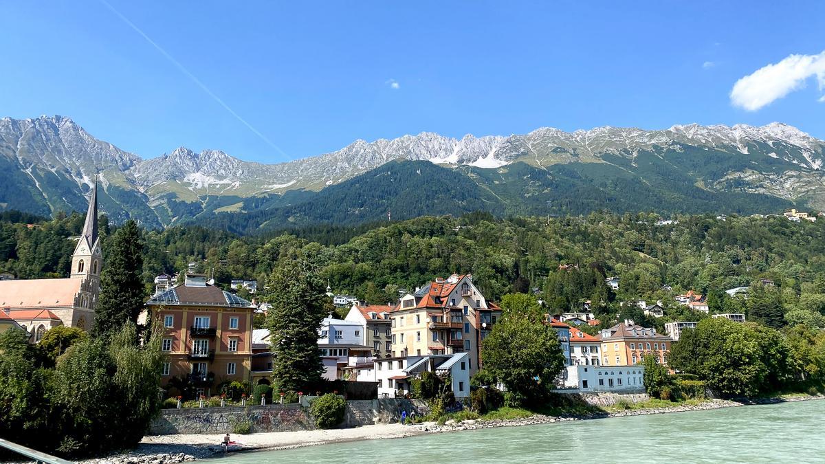 Majestic Inn River and Innsbruck's Cityscape