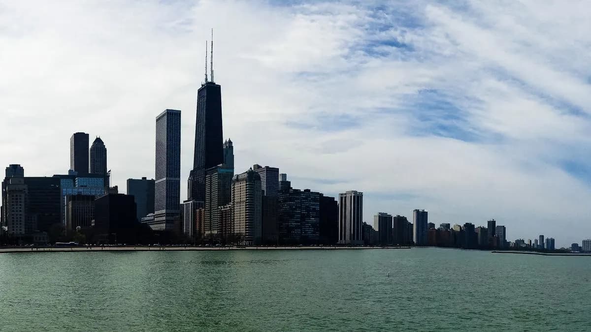 Chicago skyline view from Lake Michigan with serene waters and skyscrapers