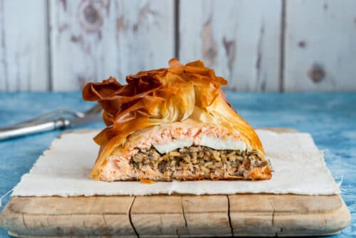 Russian Kulebiaka or Coulibiac dish filled with Salmon and rice