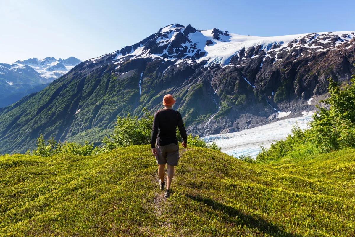 man walking to exit glacier, alaska