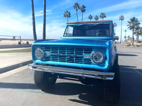 Ford vehicle driving on beach