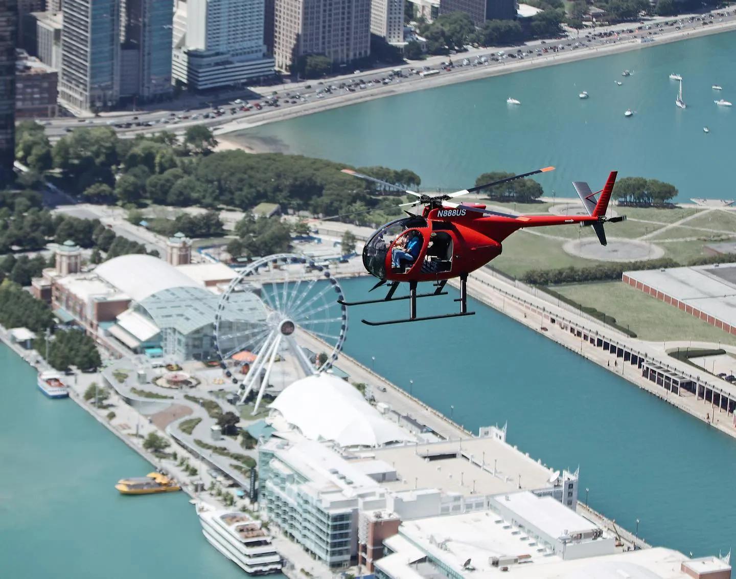 Helicopter from Heli Chicago flies over Navy Pier