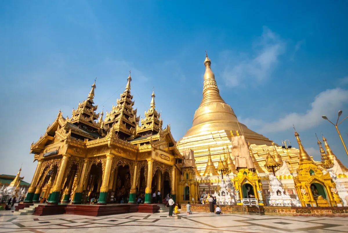 Tourists exploring Shwedagon Pagoda in Myanmar