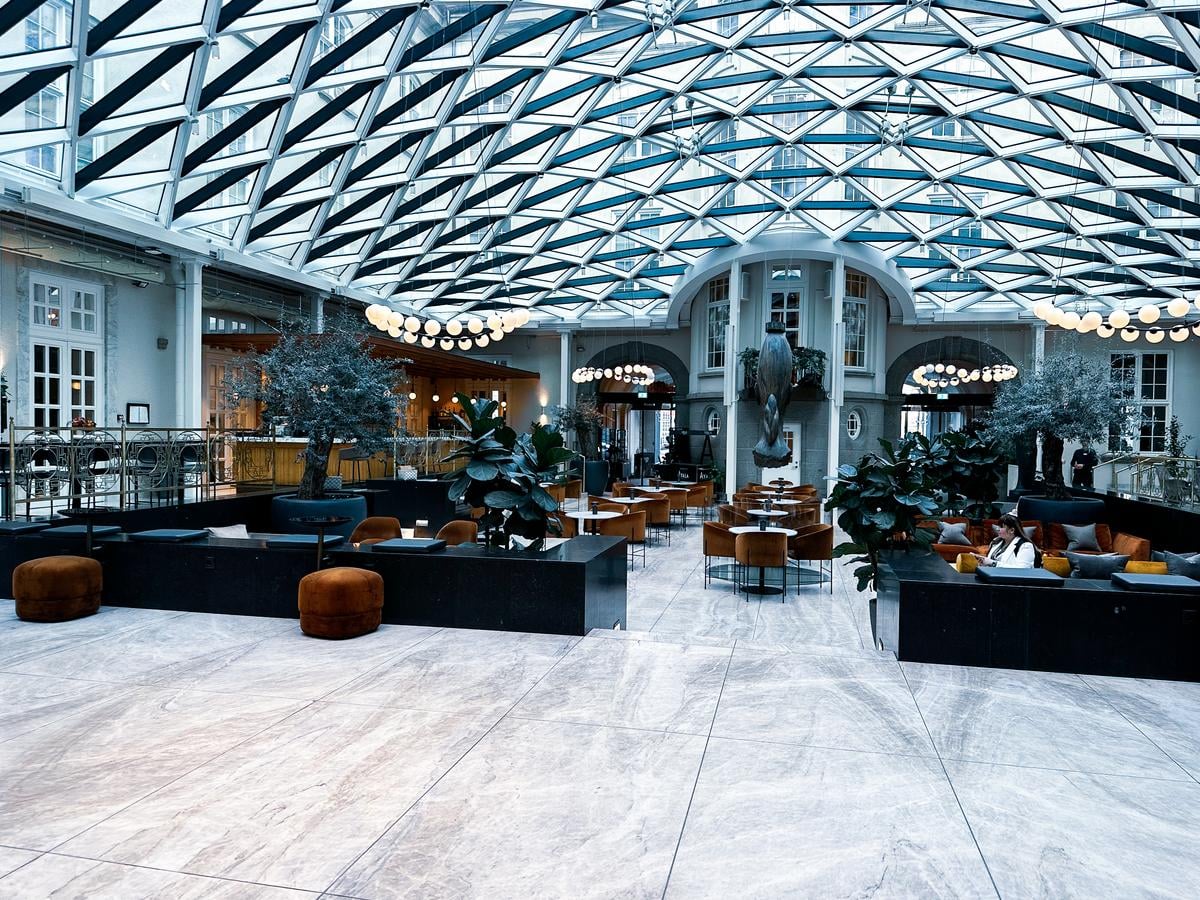 Elegant lobby interior of Villa Copenhagen hotel with modern and classic design elements
