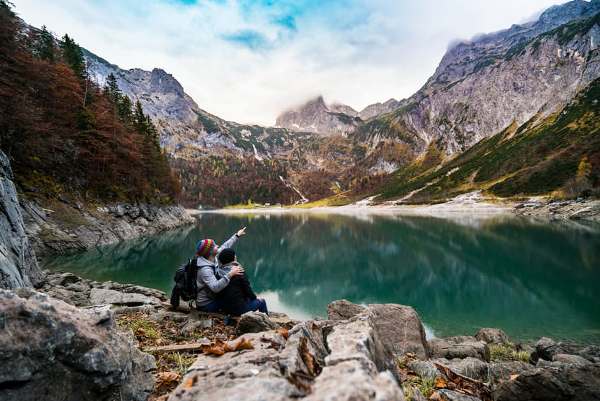 Couple enjoying scenic mountain lake hike.