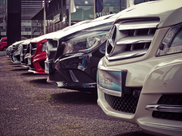 Row of rental cars available for out-of-state travel.