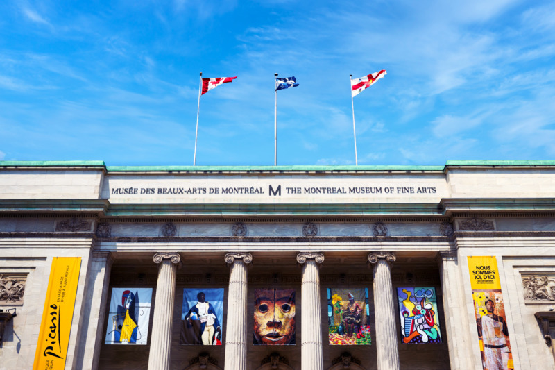 "Montreal Museum of Fine Arts building exterior with large columns and flags"