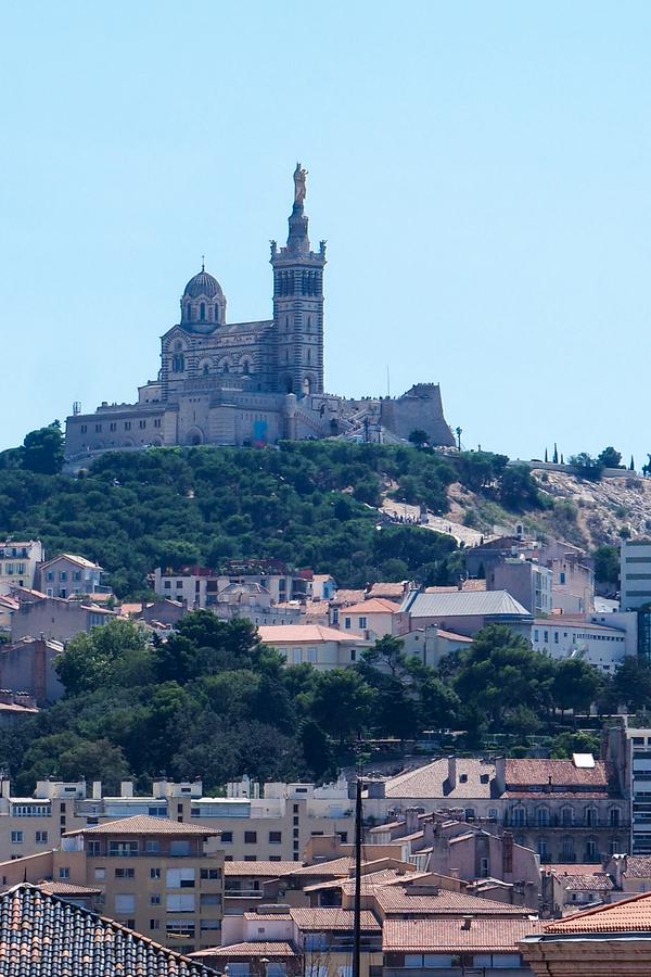Basilica of Notre-Dame de la Garde in Marseille, France, overlooking city from hilltop
