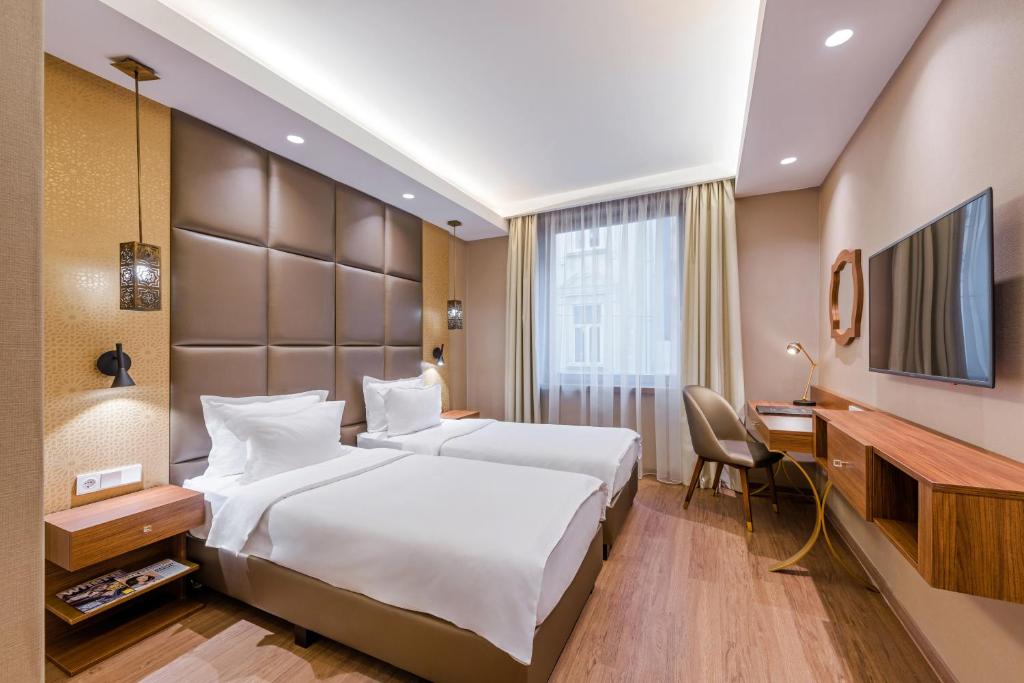 Elegant hotel room with modern amenities at Continental Hotel Budapest Room
