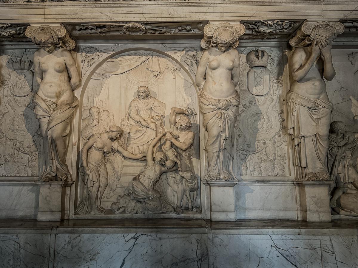 Classical marble relief and carved stonework inside the palace