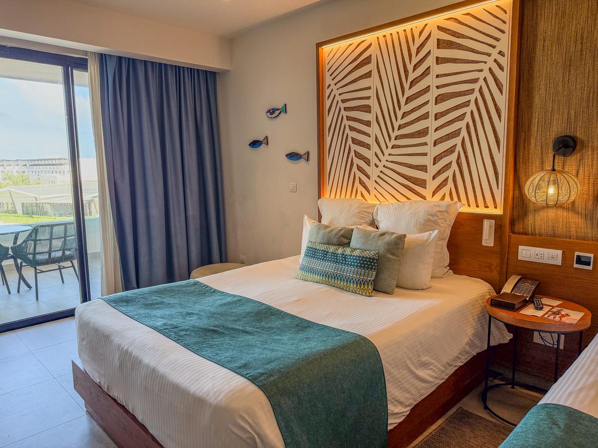 Luxury hotel room at Dreams Macao Beach Punta Cana all-inclusive resort in the Caribbean
