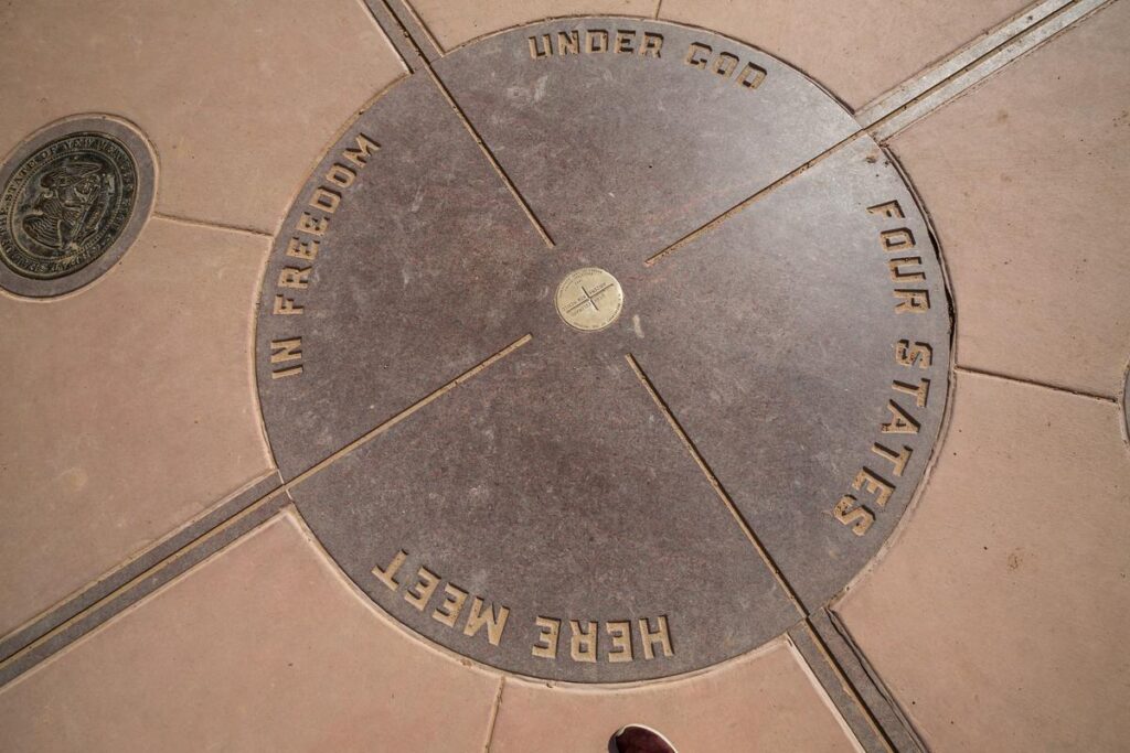 Bronze survey disk marking the legal Four Corners state intersection