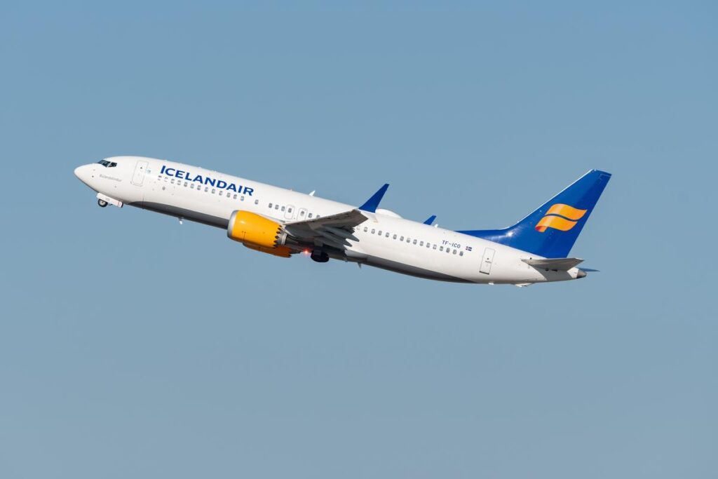 Icelandair 737-8 MAX taking off in clear blue sky