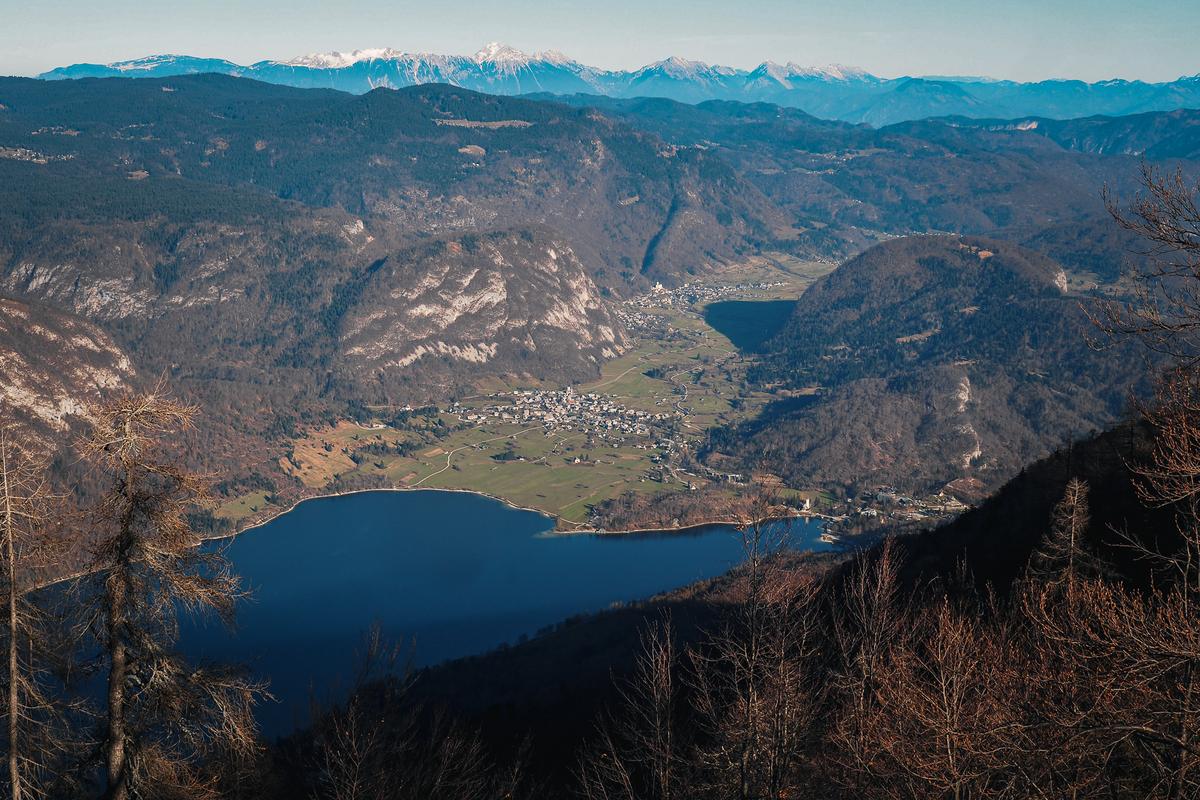 Breathtaking panoramic view of Lake Bohinj from Mount Vogel, Slovenia's hidden alpine gem.