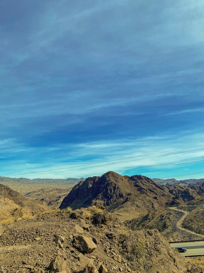 Breathtaking panoramic view from Lake Mead - Lakeview Overlook with rugged mountains and blue sky