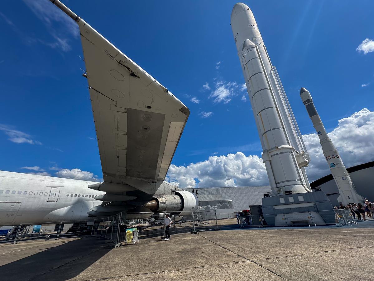 Diverse aerospace exhibits at Musée de l'Air et de l'Espace, featuring aircraft and rockets.