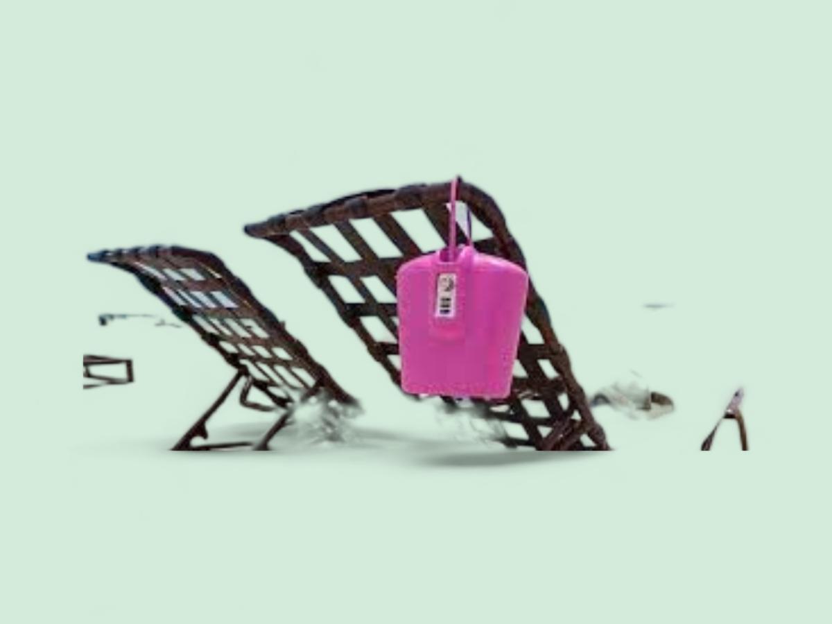 Pink SAFEGO secured on a beach bench