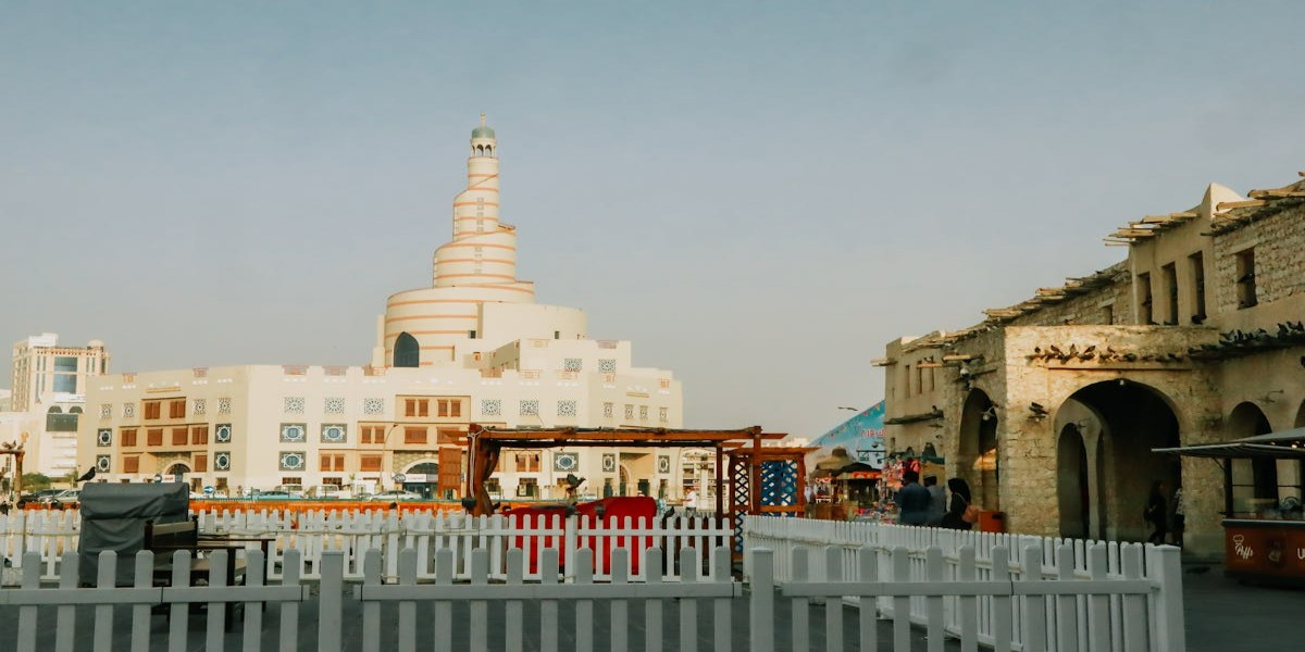 Scenic view of Souq Waqif and spiral mosque in Doha