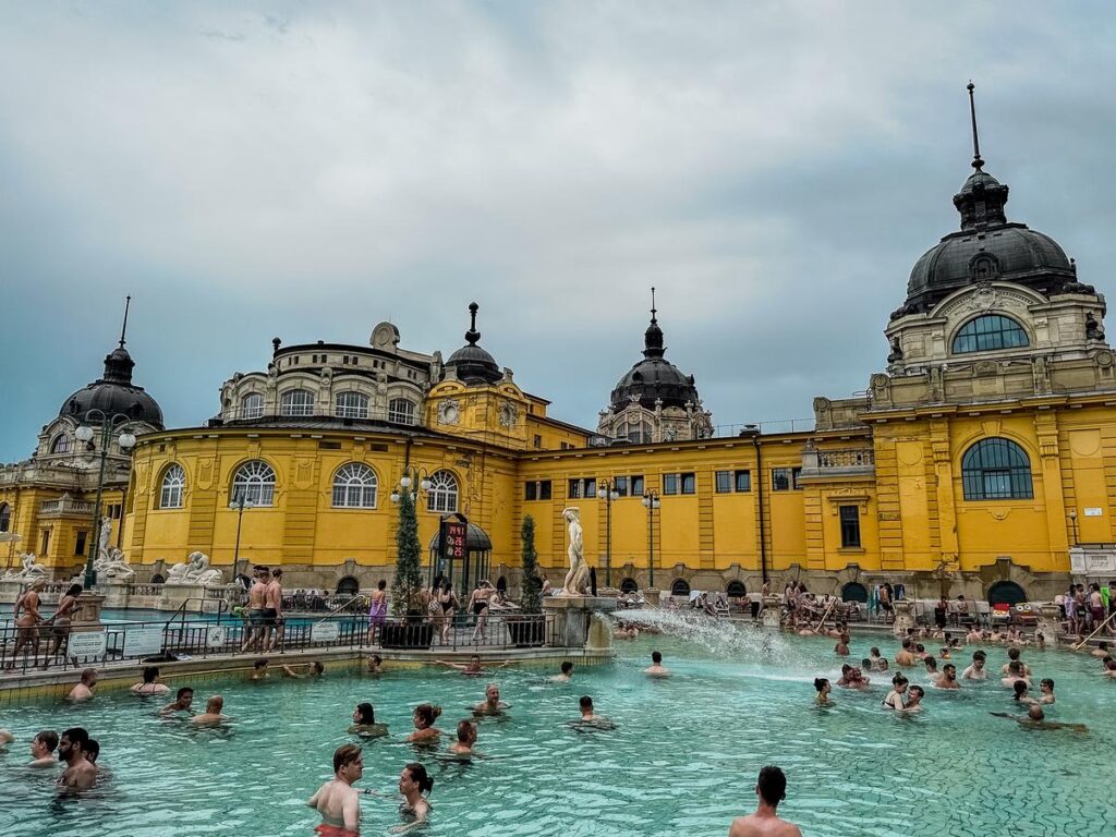 Vibrant scene at Szechenyi Thermal Baths, top wellness destination in Budapest, Hungary.