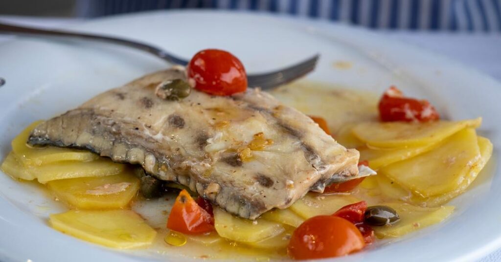 Traditional Ligurian Croaker Fish Dish with Vegetables