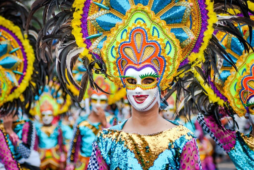 Colorful Masskara Festival celebration with bejeweled costume
