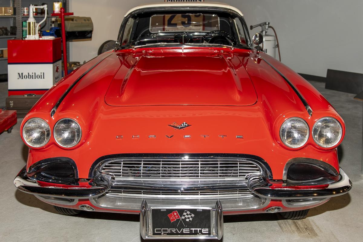 Vintage red Corvette on display at National Corvette Museum, Bowling Green - classic car exhibition.