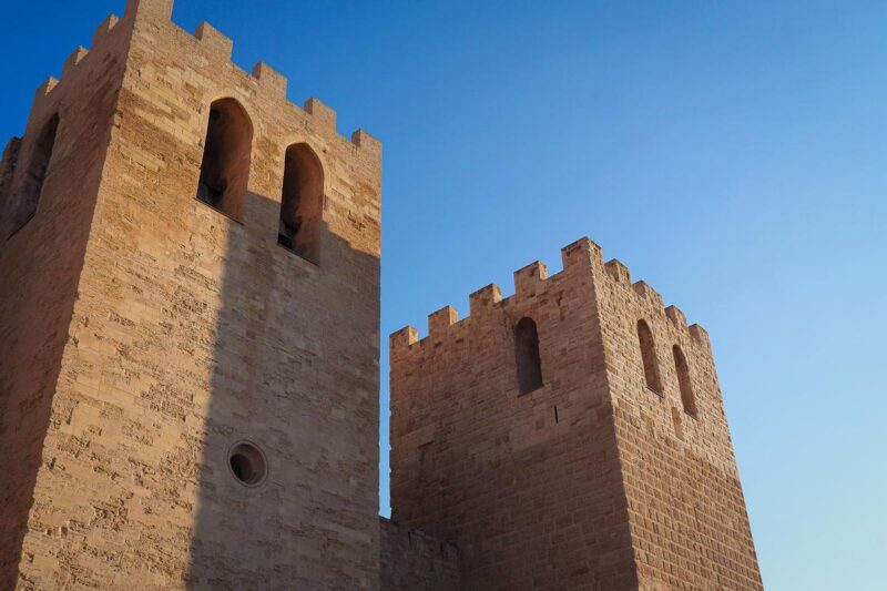 Abbaye Saint-Victor Marseille limestone towers clear blue sky historic landmark