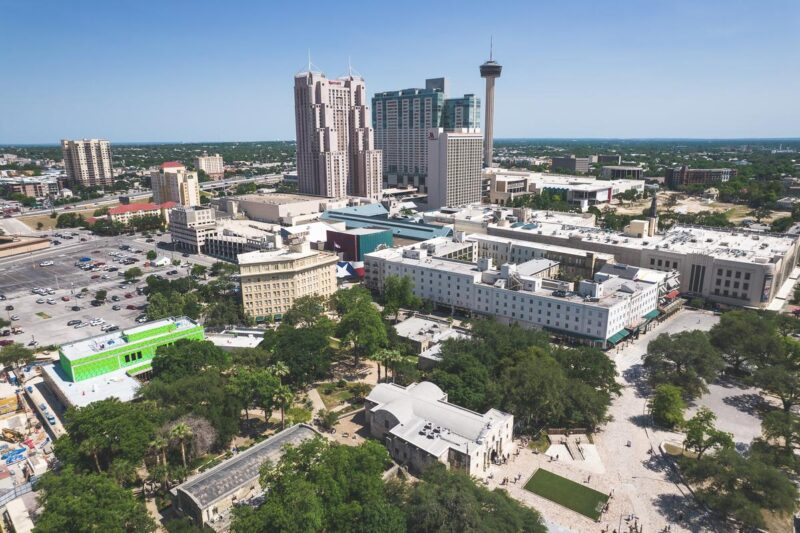 Aerial view of San Antonio downtown with historic Alamo landmark, Marriott Hotel, and Tower of the Americas.