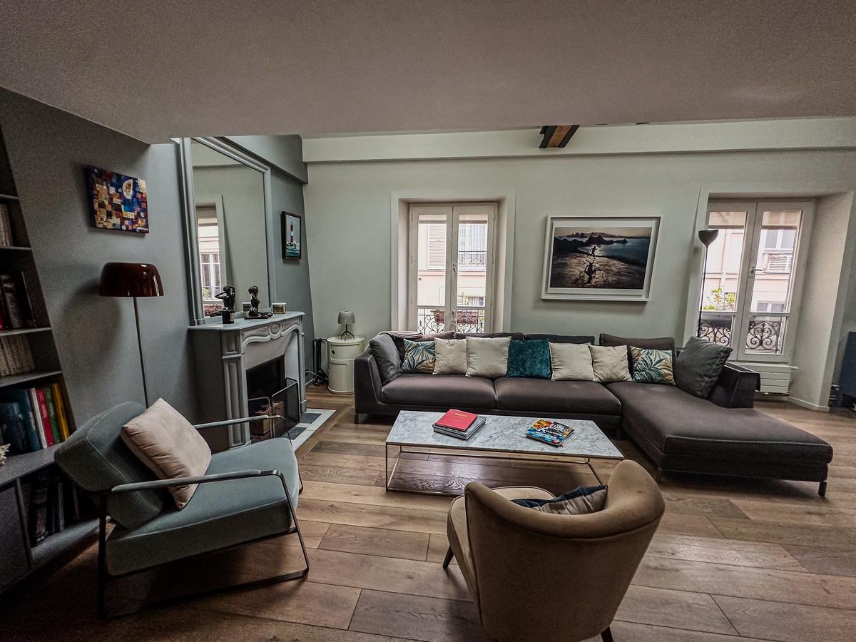 Stylish Airbnb vacation rental in Paris with modern decor and comfortable seating area