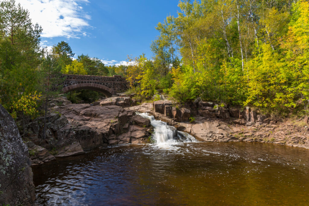 Stone arch bridge and the Amity Creek Falls in Duluth, Minnesota