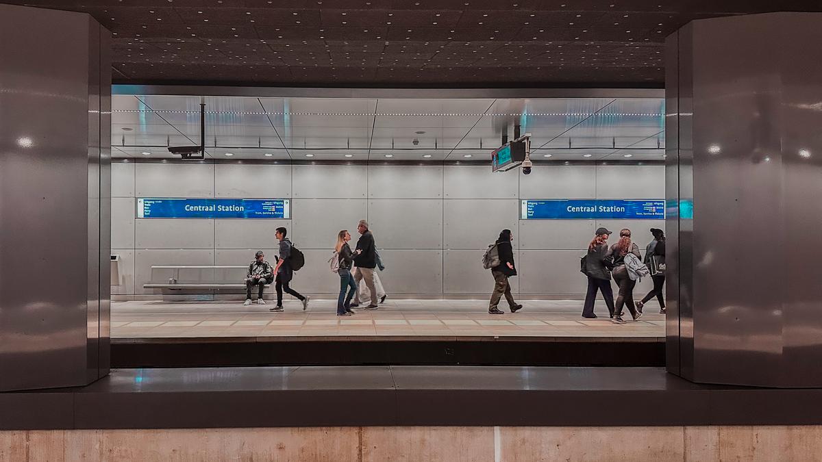 Amsterdam Central Station subway bustling with commuters