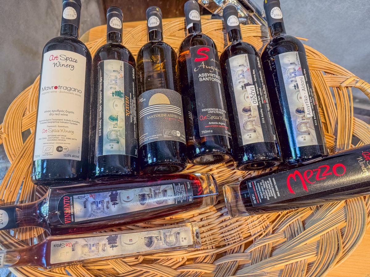 Wine bottles at Santorini Art Space Winery, Greece – explore local vineyards and art exhibits
