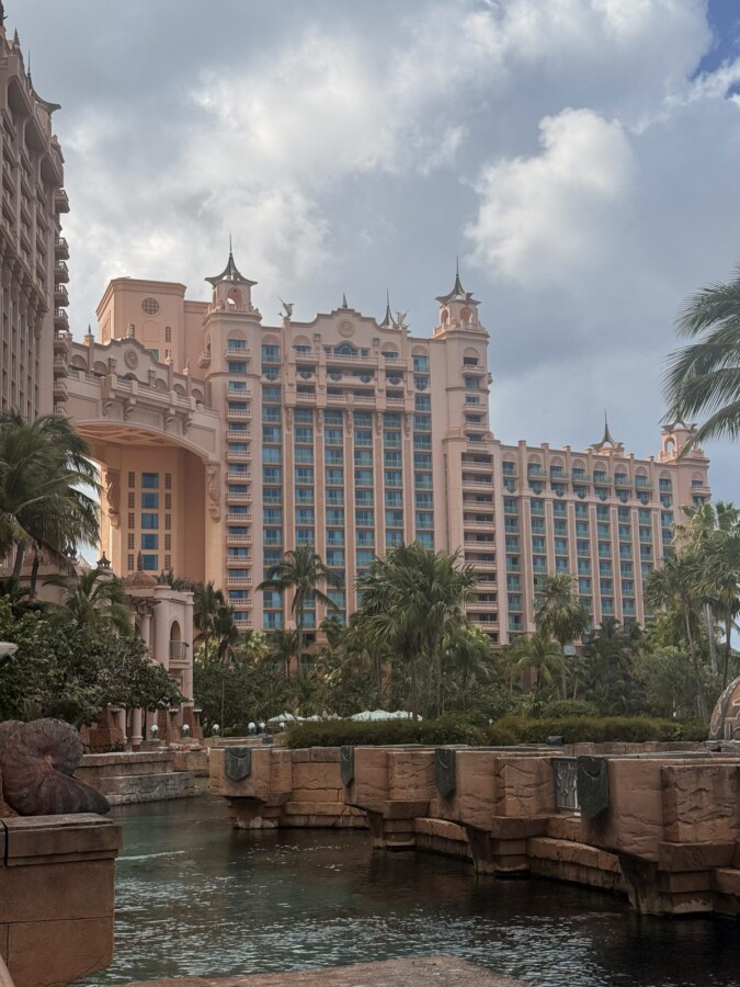 Royal Towers of Atlantis resort rising above palm trees and waterways on Paradise Island, Nassau