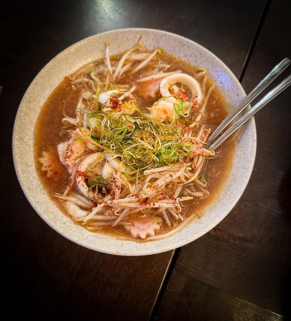 Bowl of soba noodles with seafood and vegetables at Restaurant Kyo
