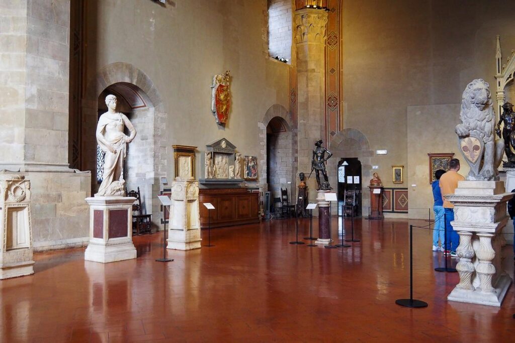 Interior of Bargello National Museum, Florence: Renaissance sculptures, artifacts, and grand gallery ambiance.