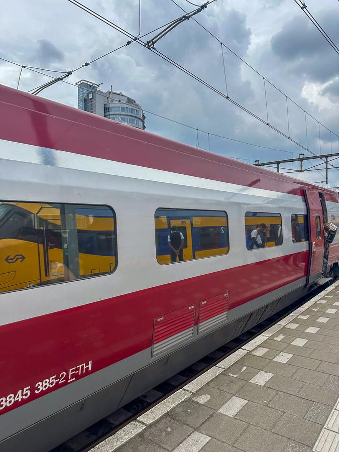 Passengers boarding a Eurostar train at Amsterdam Centraal Station