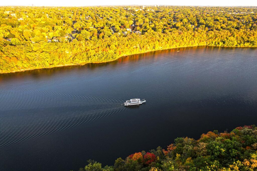 Boat cruise on the autumn Mississippi River