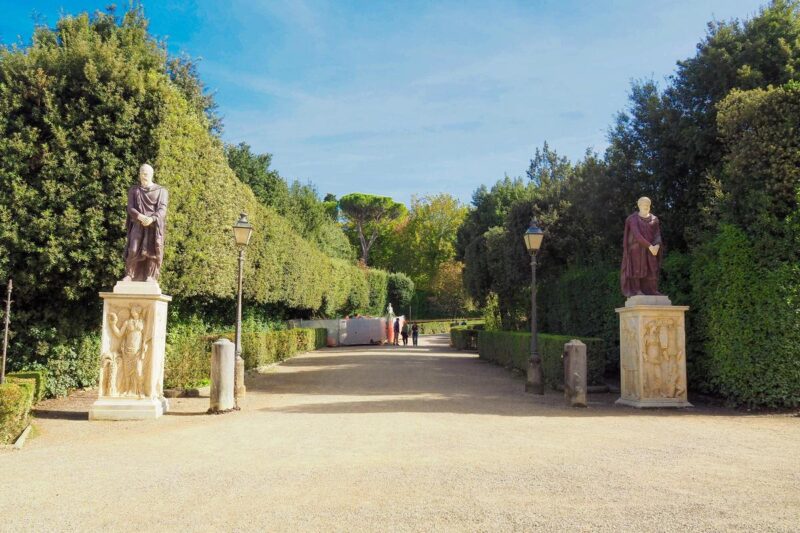 Boboli Gardens Florence with statues, obelisk, and tourists