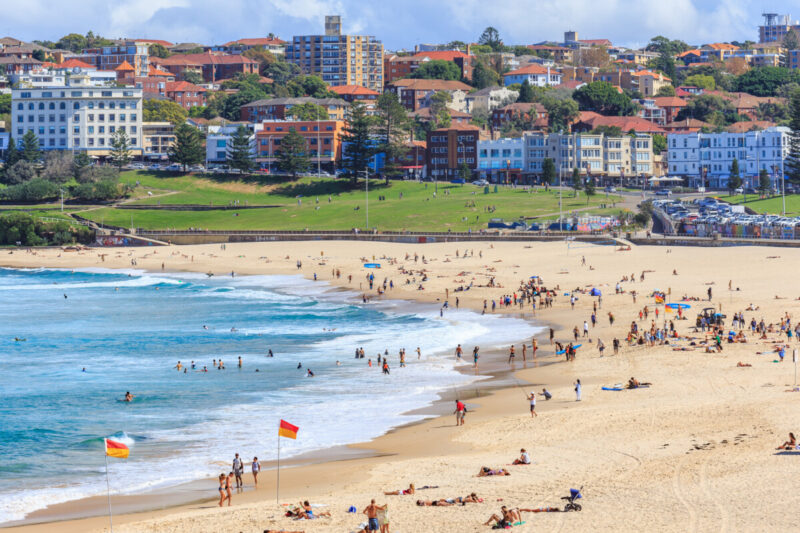 People relaxing and swimming in Bondi Beach, Australia