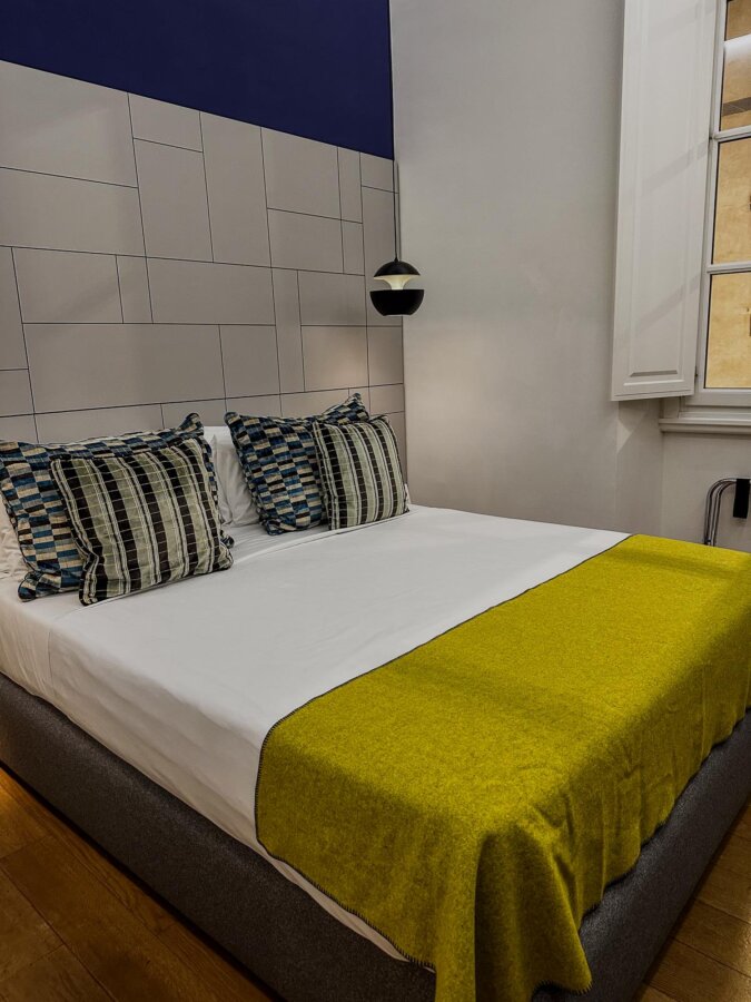 Elegant Hotel Milu room in Florence with chic decor and luxury amenities
