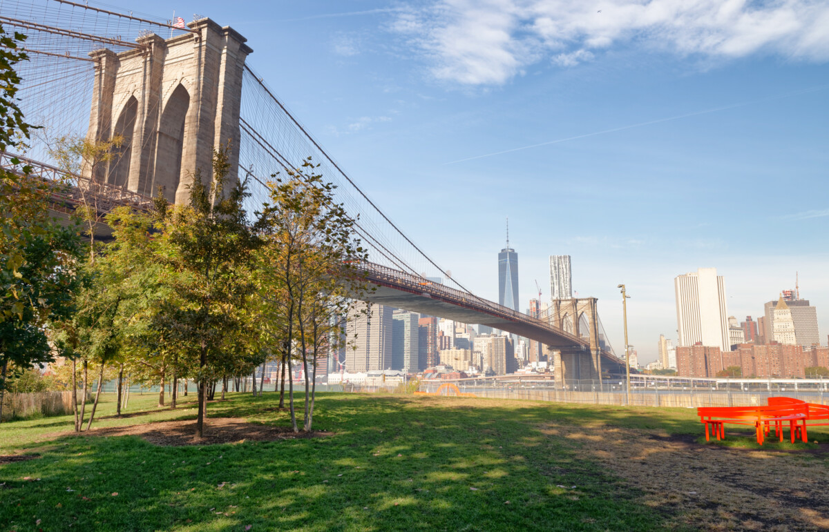 Brooklyn Bridge Park and the view of Brooklyn Bridge and Manhattan skyline in New York City