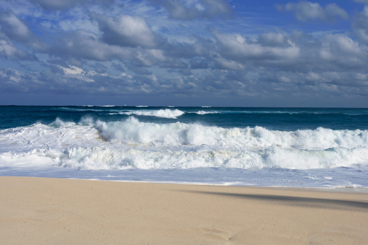 White sand and turquoise surf at Cabbage Beach on Paradise Island