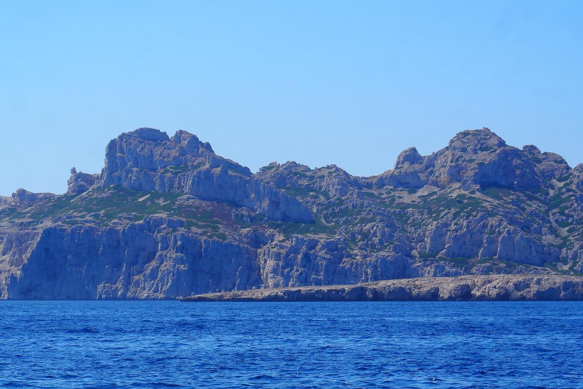 Scenic coastal view of Calanques National Park in Marseille with cliffs and clear blue waters